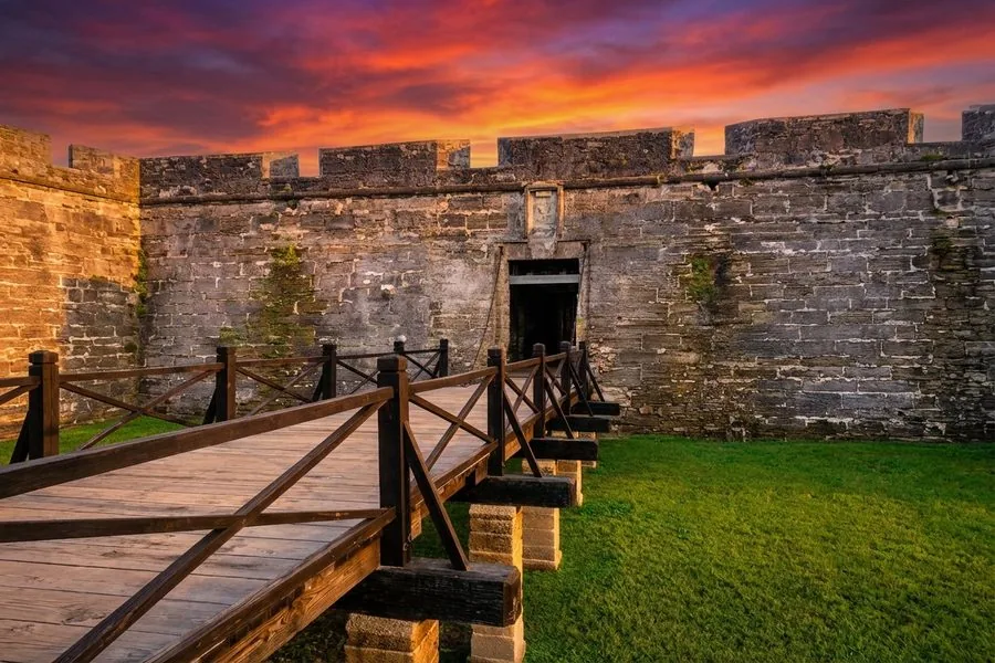 Castillo de San Marcos entrance gate and wooden drawbridge at sunset, St. Augustine