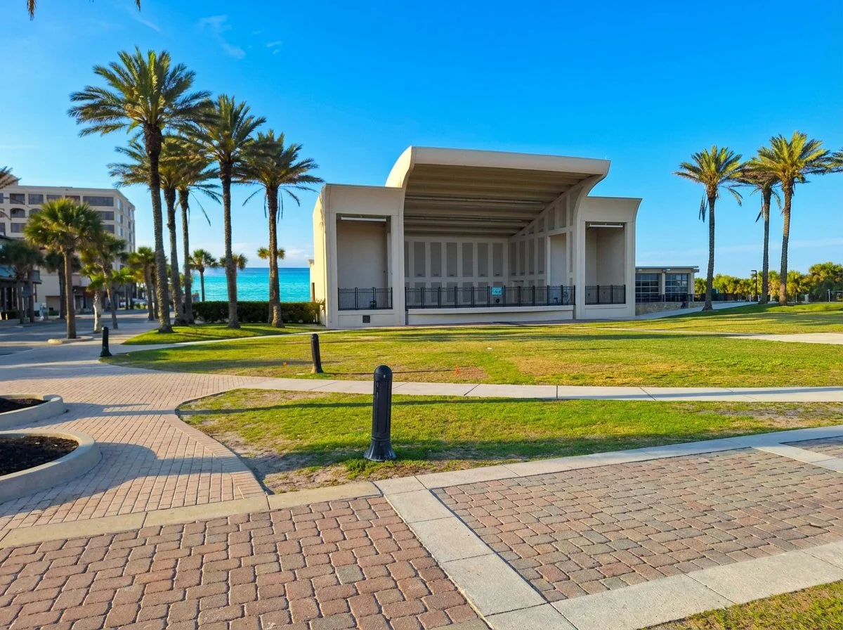 SeaWalk Pavilion outdoor amphitheater in Jacksonville Beach with palm trees and Atlantic Ocean behind the stage