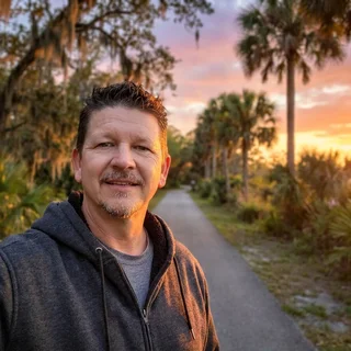 Roger Baldwin, Publisher of First Coast Explorer, on a First Coast trail at sunset